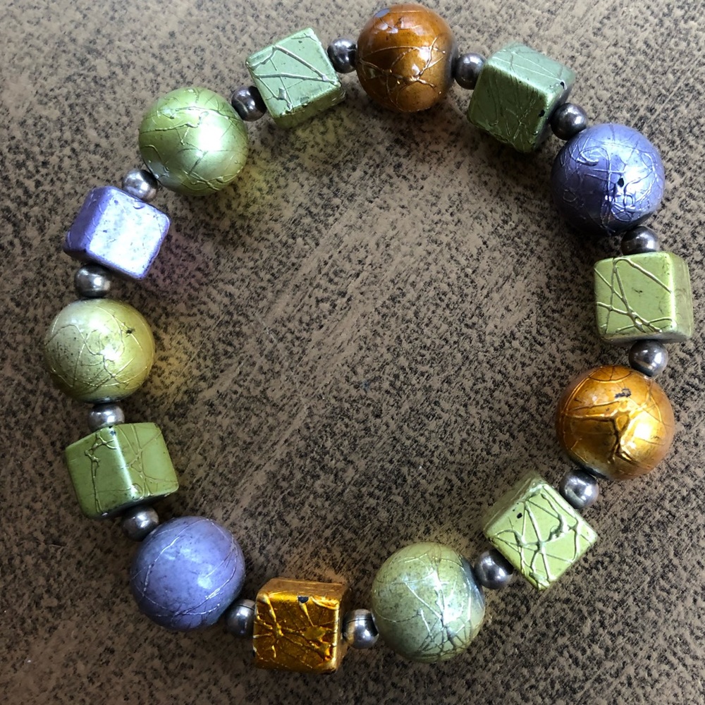 Iridescent beaded bracelet in lavender, sage green, and orange - Picture 4 of 5